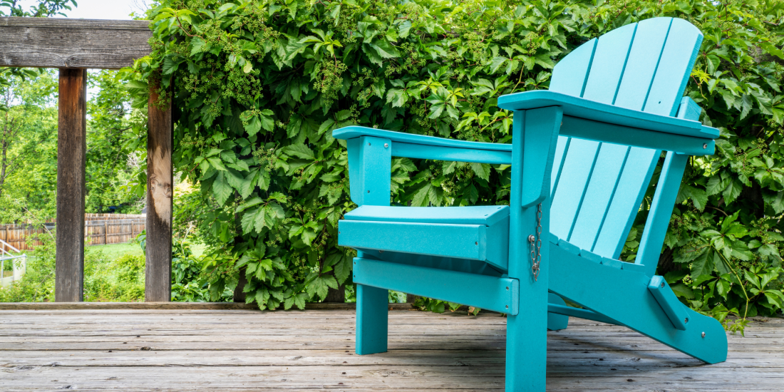 Teal chair on a deck